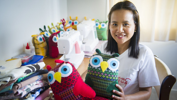 Pakao Sorn and her handmade owls.