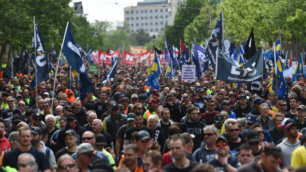 Thousands of people gather for a union rally through the streets of Melbourne on Tuesday.