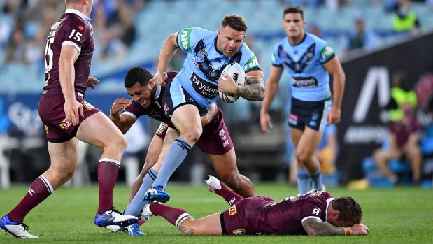 Jake Friend on the ground after a big collision with Nathan Brown in Origin II.