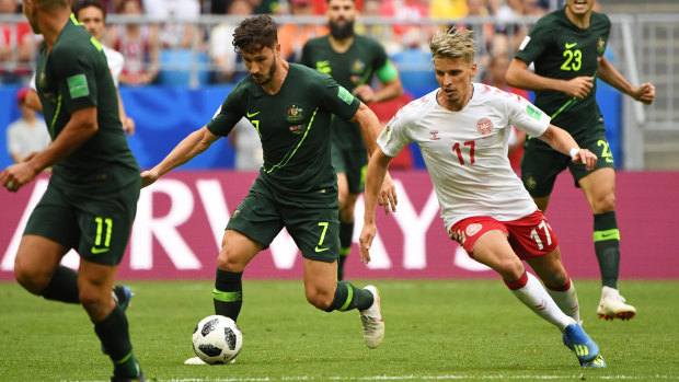 Out of their hands: Mat Leckie and the Socceroos must win against Peru, and hope Denmark lose against France.