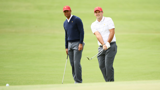 Tiger Woods with under-fire star Patrick Reed.