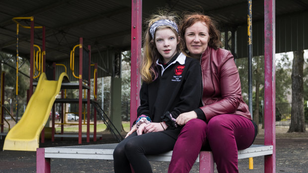 Rebecca Davey, pictured with her 12-year-old daughter, Molly Browne, says the decision is case of discrimination.