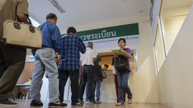 Patients wait to register for a consultation at the first full-time clinic prescribing cannabis oil for medical treatment in the Public Health Ministry in Nonthaburi province, Thailand. 