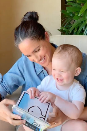 Meghan, the Duchess of Sussex, reads 'Duck! Rabbit!' to son Archie. He turned one in May.