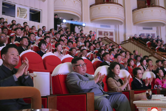 In this photo provided by the North Korean government, North Korean leader Kim Jong-un claps with his wife Ri Sol-ju (third from right) and his aunt Kim Kyong-hui (second from right) as they attend a concert celebrating Lunar New Year's Day in Pyongyang.