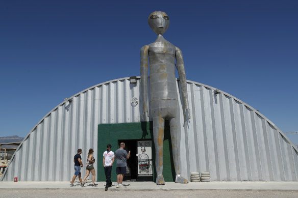 People visit the Alien Research Centre in Hiko, Nevada, near Area 51.