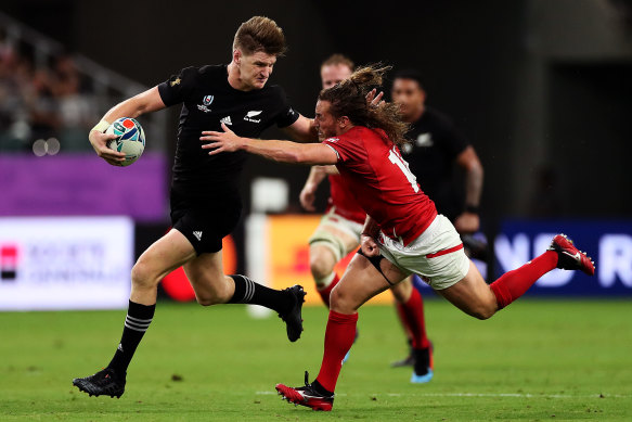 All Black Jordie Barrett is tackled.