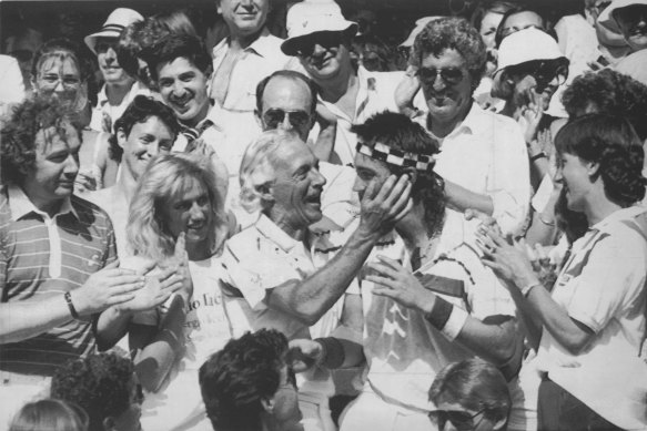 Pat Cash is congratulated by his coach Ian Barclay.