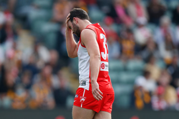 Patrick McCartin comes from the ground after suffering a concussion.