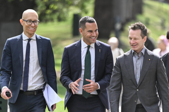 Independent Sydney MP Alex Greenwich with his legal team, Dowson Turco partner Nicholas Stewart, left, and barrister Dr Matt Collins, KC, right, in Melbourne on Wednesday.