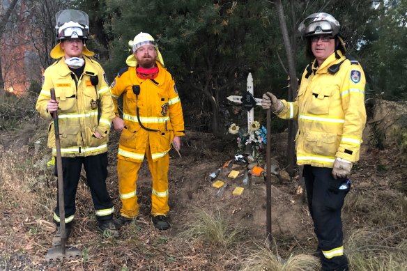 Three members of the Hawkesbury RFS brigade, Matthew Shepherd, Jared Robinson and Ben Vilnis, were creating a space around a memorial for a dead motorcyclist.
