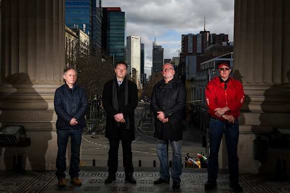 Save Victorian Events spokesman Simon Thewlis, amusement business owner Damian de Jong, events organiser Steve Smith and Tiny Good outside Parliament on Tuesday.