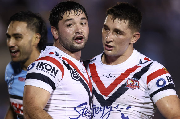 Roosters forwards Brandon Smith and Victor Radley.