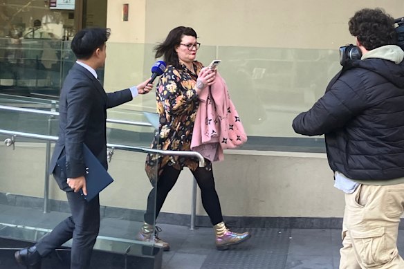 Theresa Plunkett-Hill leaves court on Thursday.
