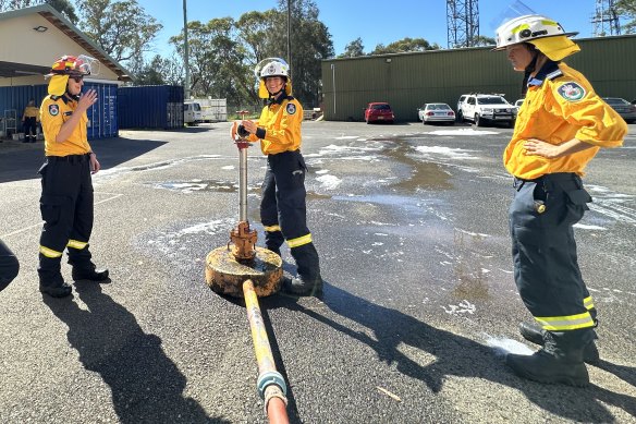 Trainee Sandra Odwazny “ships” a standpipe to tap into mains water.