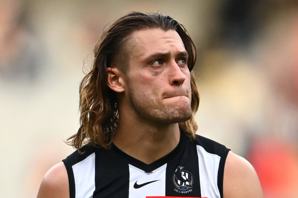 Sidelined: Collingwood defender Darcy Moore.