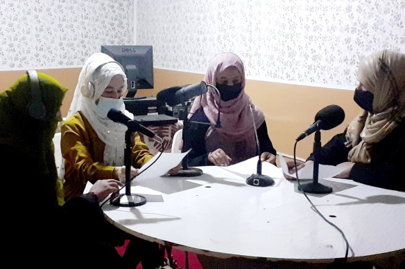 Najia Sorosh head of Sadai Banowan, a women-run radio station, and  other staff in the broadcasting studio last month.