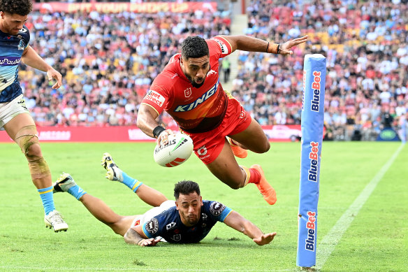 Third time lucky: Roberts Jennings scores for the Dolphins.