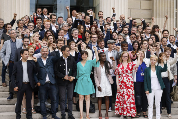No-Tie Team: Newly elected MPs of hard-left party La France Insoumise (LFI) pose at the National Assembly, in Paris.