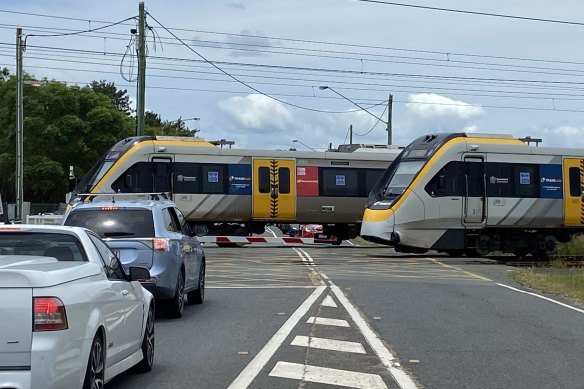 A nearby resident says the level-crossing boom gates frequently jam, holding up traffic.