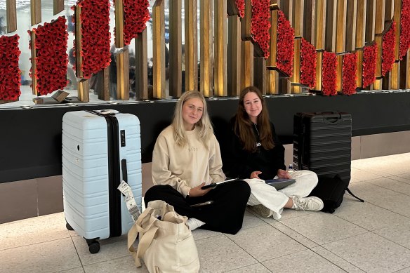 Friends Ella and Erica were attempting to book new flights from the airport on Wednesday.