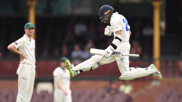 Jason Sangha celebrates his maiden Shield ton.