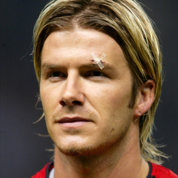 David Beckham sports a plaster over his eyebrow after the infamous boot-kicking incident in the dressing room. 