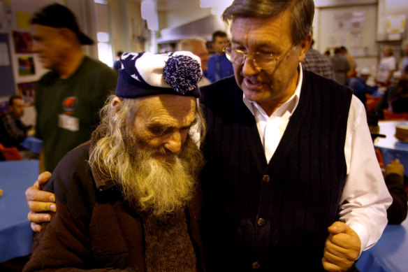 Father Ernie Smith (right) founded the Sacred Heart Mission to help the vulnerable but was stood down for breaching his vow of celibacy.