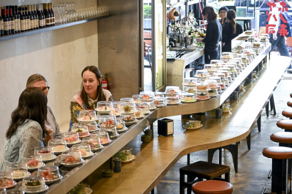 The sushi train, imported from Taiwan, fits the narrow Bourke Street site.