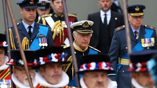 King Charles III follow the coffin of Queen Elizabeth II.