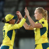 Aussie women celebrate.