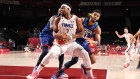 Not a dream run. Guerschon Yabusele of Team France looks to drive past Jayson Tatum of Team United States on Sunday.