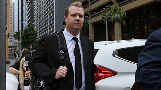 Senior Constable Kristian White arrives at the NSW Supreme Court in Sydney for a detention application by prosecutors after he was found guilty of the Taser manslaughter of 95-year-old Clare Nowland.