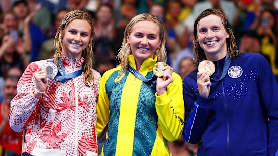 NANTERRE, FRANCE - JULY 27: Silver Medalist, Summer McIntosh of Team Canada, Gold Medalist, Ariarne Titmus of Team Australia and Bronze Medalist, Katie Ledecky of Team United States pose with their medals during the Medal Ceremony after the Women’s 400m Freestyle Final on day one of the Olympic Games Paris 2024 at Paris La Defense Arena on July 27, 2024 in Nanterre, France. (Photo by Maddie Meyer/Getty Images)