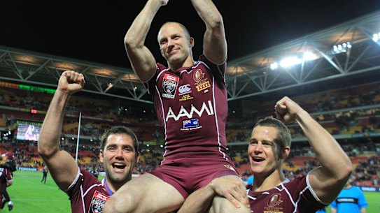 Fitting: Darren Lockyer is carried from the ground after his final Origin match.