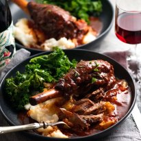 Lamb shanks in red wine sauce.