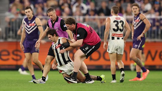 Collingwood’s Lachie Schultz stumbles leaving the field in the round nine match against Fremantle.