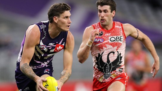 Rory Lobb is run down by Robbie Fox.