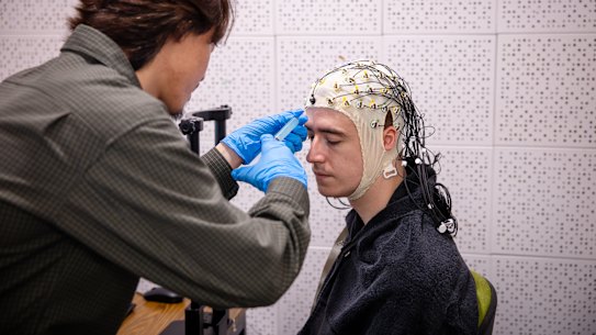 Conductive gel is injected onto the scalp.