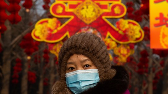 The coronavirus threat cast a pall over Lunar New Year celebrations in Beijing.