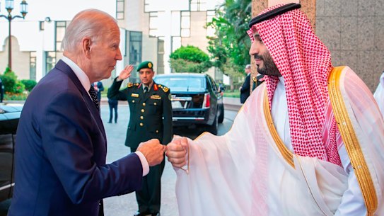 Saudi Crown Prince Mohammed bin Salman, right, greets US President Joe Biden with a fist bump in Jeddah.