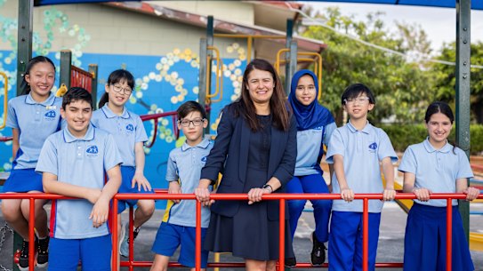 Beverley Hills Primary School acting principal Elena Pitsiakkos with year 5 students, from left, Alina, Azlan, Clara, Quinton, Rahma, Morgan and Olivia.