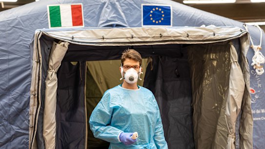 A medical worker at a pre-triage centre in Turin, Italy.