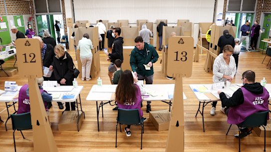 Voters cast ballots at a polling station during a federal election in Sydney on Saturday.