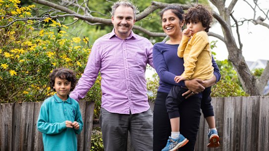 Mabrooka Singh and Michael Neve with their children Sidney, 6, and Arjan, 3 at home in Oak Park.