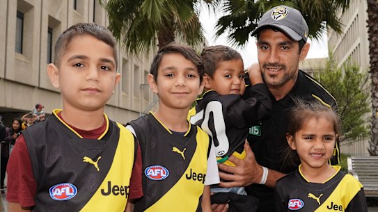 Grand final debutant Marlion Pickett with his children (from left): Marlion (9), Latrell (8), Levi (2), and Shaniquae (4).