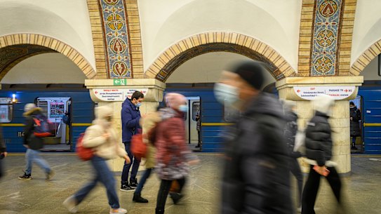 Commuters in the Golden Gate Metro station in Kyiv, on Friday.