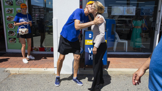 Churchlands candidate Basil Zempilas greets Libby Mettam at the Scarborough Beach Road polling booth.