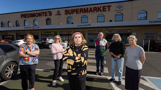 The residents opposing out the front of Piedimonte’s Supermarket on Monday morning.