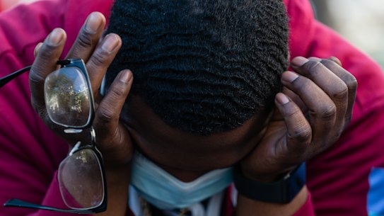 A person reacts to the guilty verdict of former Minneapolis police officer Derek Chauvin at Black Lives Matter Plaza in Washington.
